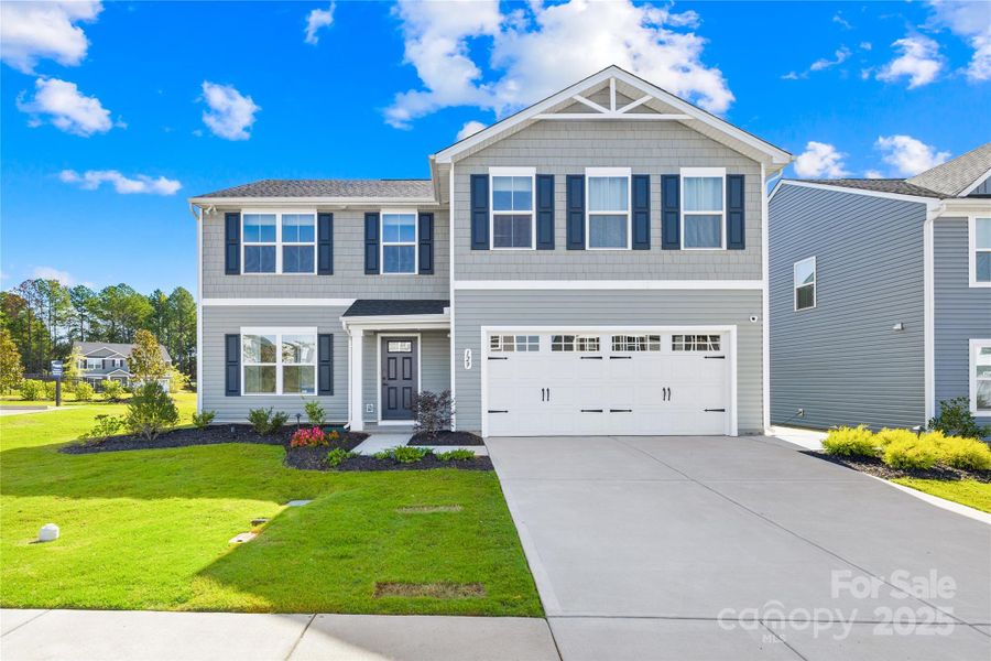 Front exterior of a new home in , Lancaster, SC, highlighting curb appeal (Image 17).