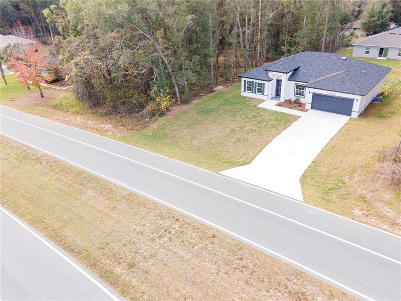 Front exterior of a new home in , Citrus Springs, FL, highlighting curb appeal (Image 19).