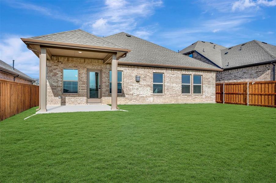 Exterior details and patio area of a home in Aspire at Reunion, Newark (Image 2). Exterior details and patio area of a home in Aspire at Reunion, Newark (Image 2).