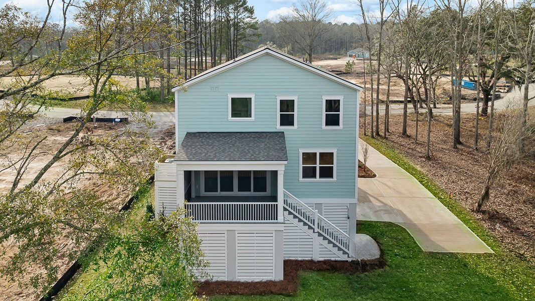 Front exterior of a new home in Rivers Reach, Yemassee, SC, highlighting curb appeal (Image 2).