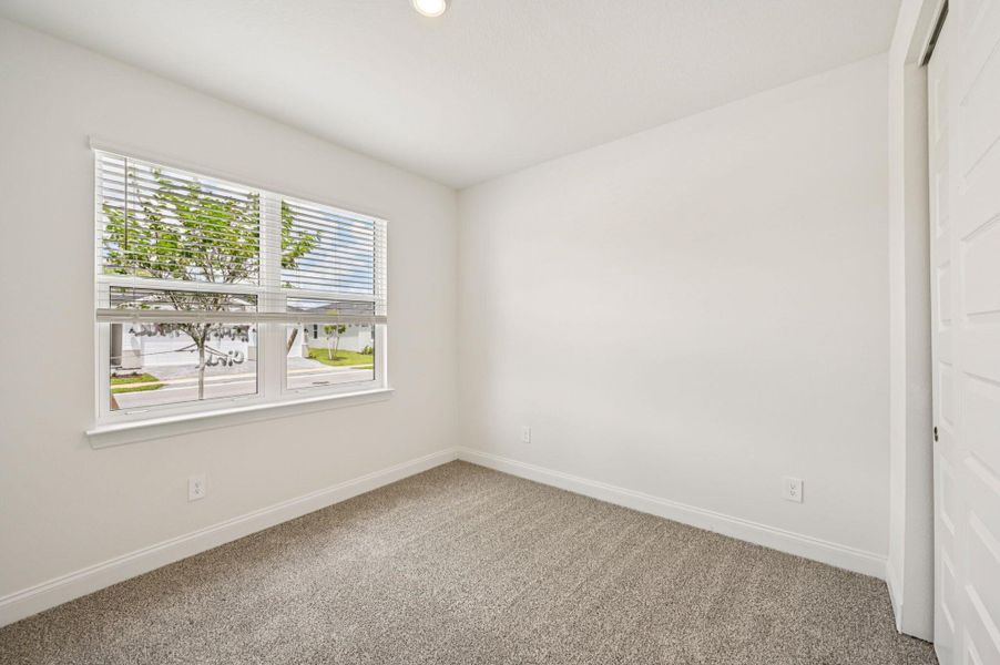 Spacious, unfurnished interior of a new home in Hampton Park - Signature Series, Vero Beach (Image 29).