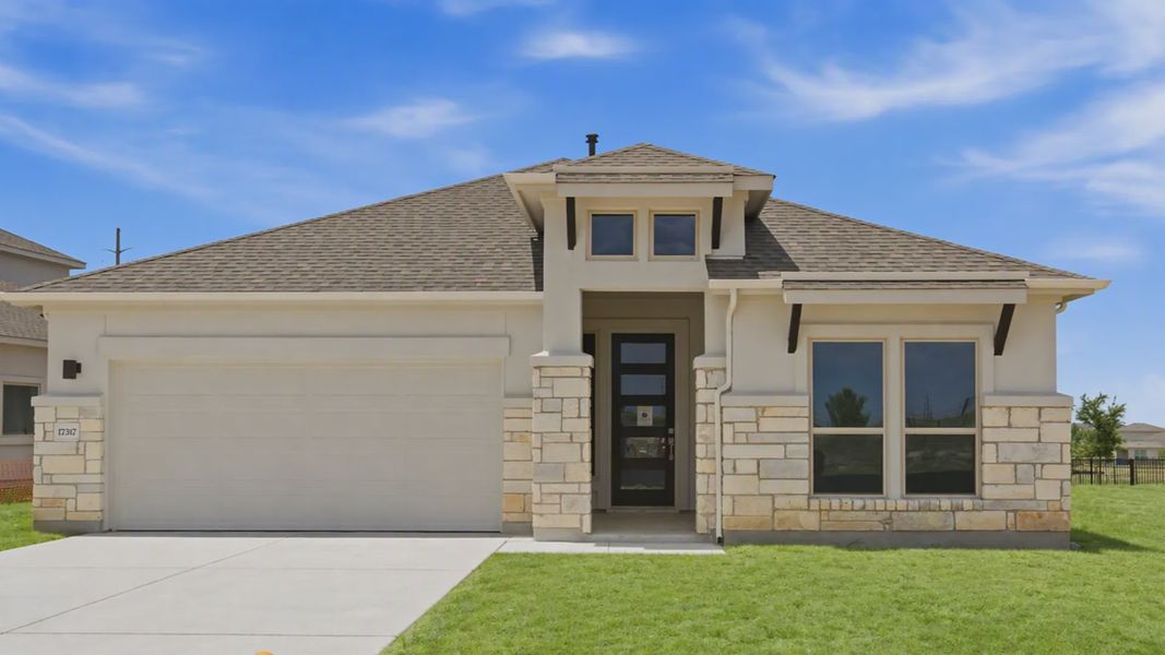 Front exterior of a new home in Preserve at Lakeside Meadows, Pflugerville, TX, highlighting curb appeal (Image 1). Front exterior of a new home in Preserve at Lakeside Meadows, Pflugerville, TX, highlighting curb appeal (Image 1).