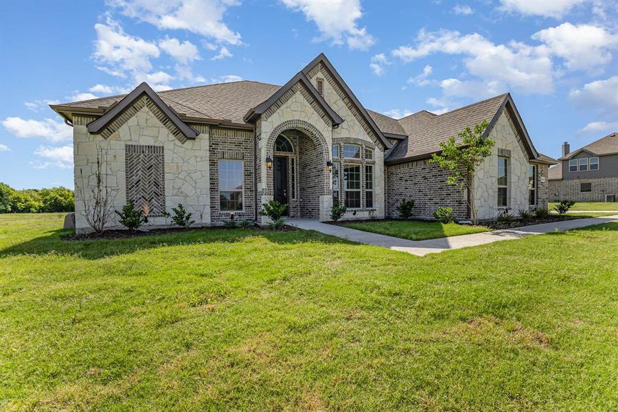 Front exterior of a new home in , Waxahachie, TX, highlighting curb appeal (Image 20).
