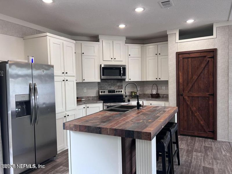 Furnished interior view inside a new home in , Live Oak (Image 6).