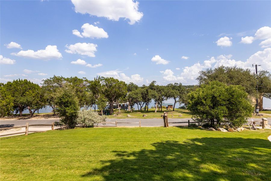 View of community featuring a lawn