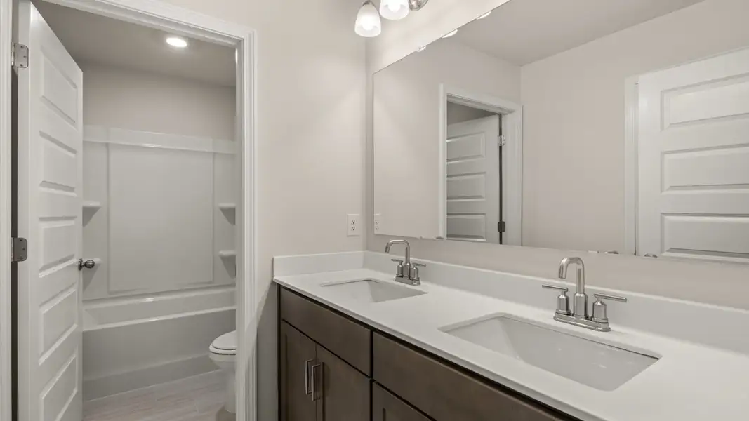 Representative furnished interior of a home built from the Hampshire by D.R. Horton in Heritage Pointe, Senoia (Image 18).