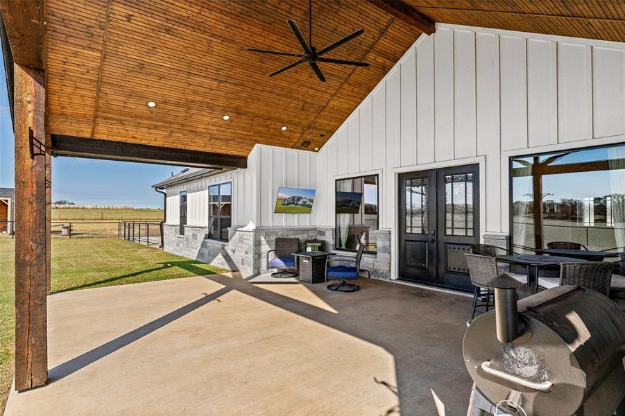 View of patio featuring french doors and ceiling fan View of patio featuring french doors and ceiling fan