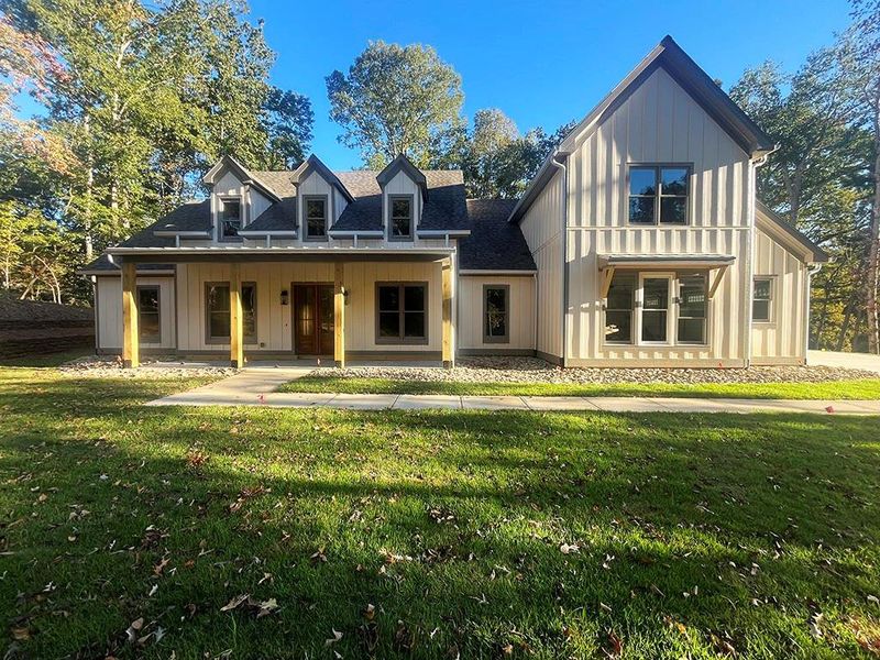 Exterior details and patio area of a home in , White (Image 33).