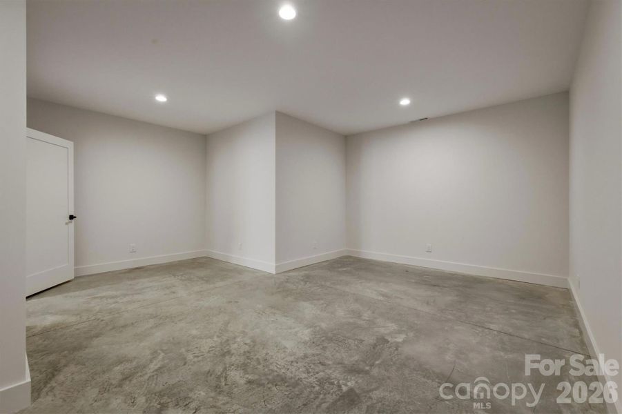 The last surprise of the lower level is this 300 square foot flex space. This room would make an excellent office, home gym, hobby room, playroom, or just extra storage. This room is heated and cooled so it can be anything that suits you. The last surprise of the lower level is this 300 square foot flex space. This room would make an excellent office, home gym, hobby room, playroom, or just extra storage. This room is heated and cooled so it can be anything that suits you.