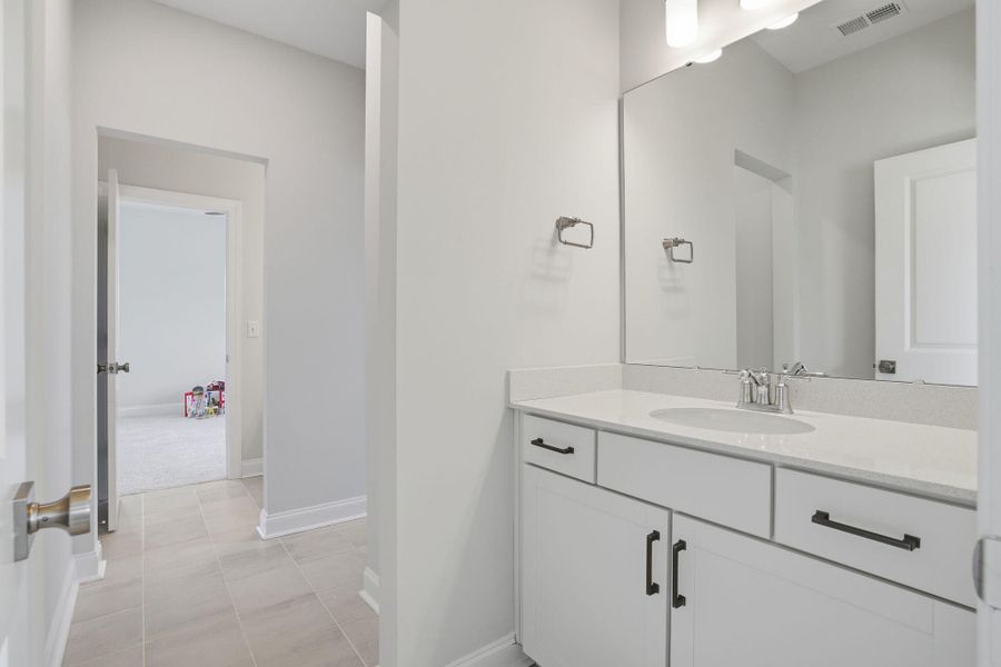Furnished interior view inside a new home in Tidewater at Lakes of Cane Bay, Summerville (Image 47).