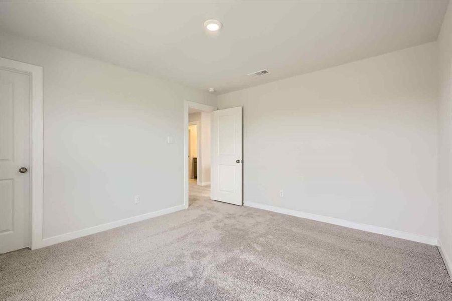 Spacious, unfurnished interior of a new home in Prestige Collection at Overland Grove, Forney (Image 9).