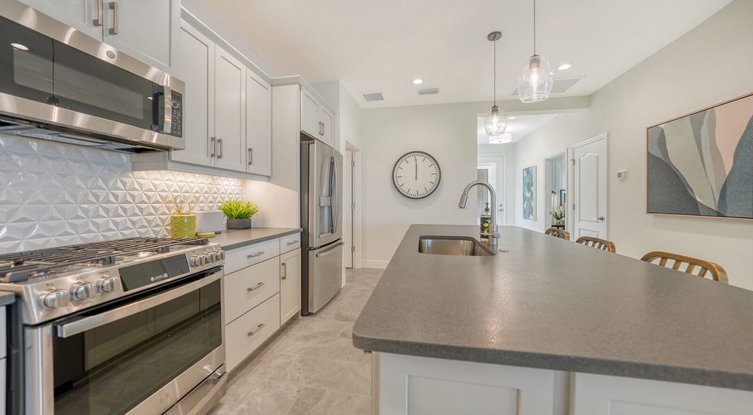 Representative furnished interior of a home built from the Sandcastle 2 by Neal Communities in Vistera of Venice, Venice (Image 15).