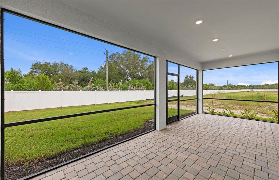 Exterior details and patio area of a home in Shores at Stillwater, Englewood (Image 4).