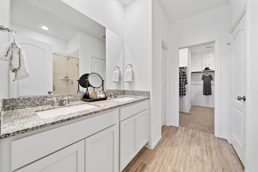 A bathroom with a marble countertop. A bathroom with a marble countertop.
