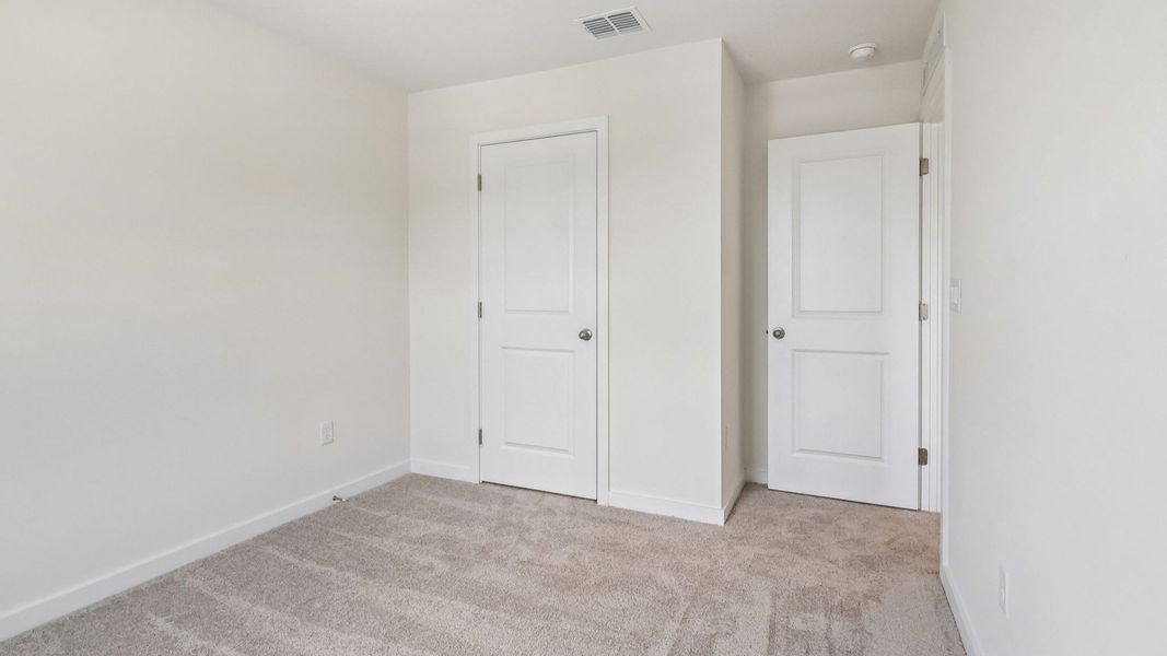 Furnished interior view inside a new home in Cyrene at Harmony, St. Cloud (Image 31). Furnished interior view inside a new home in Cyrene at Harmony, St. Cloud (Image 31).