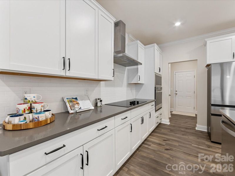 Furnished interior view inside a new home in Towns at Rea Colony, Charlotte (Image 12).