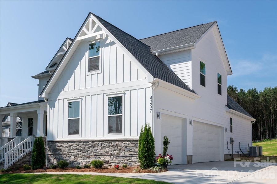 Front exterior of a new home in , Sherrills Ford, NC, highlighting curb appeal (Image 22).