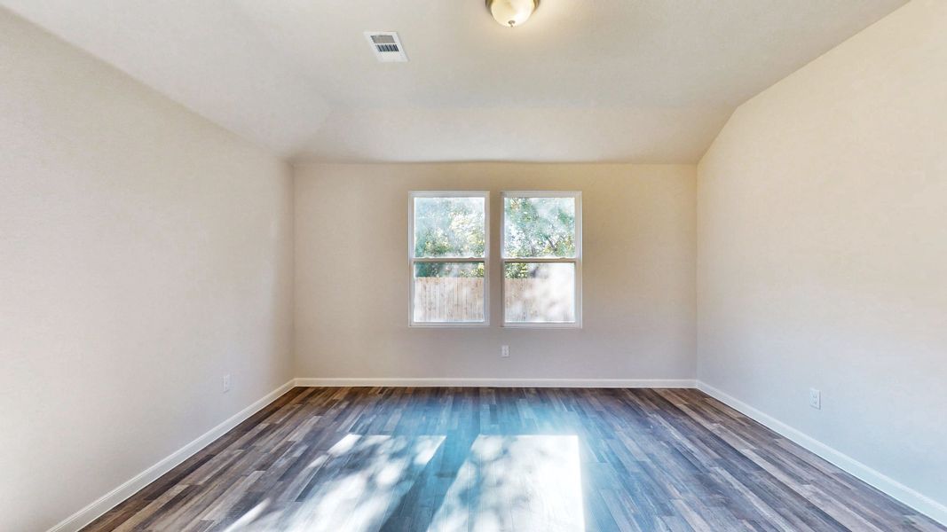 A room with a blue floor and windows. A room with a blue floor and windows.