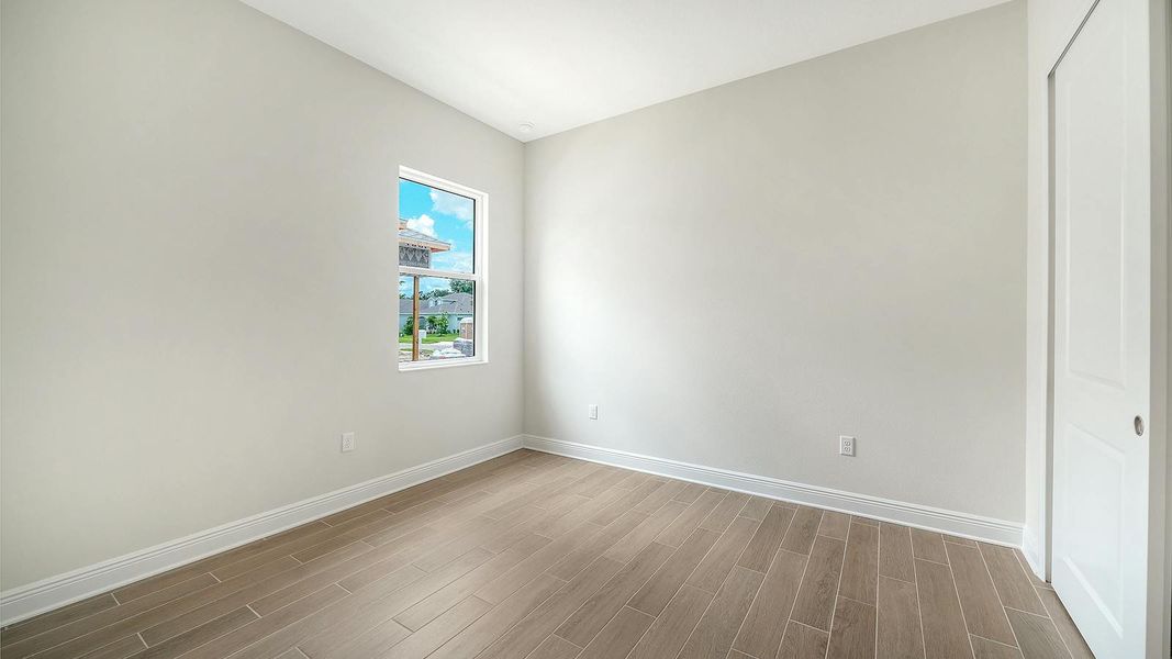 Spacious, unfurnished interior of a new home in Canoe Creek Real Estate and Homes for Sale in Parrish, FL - Neal Communities, Parrish (Image 45).