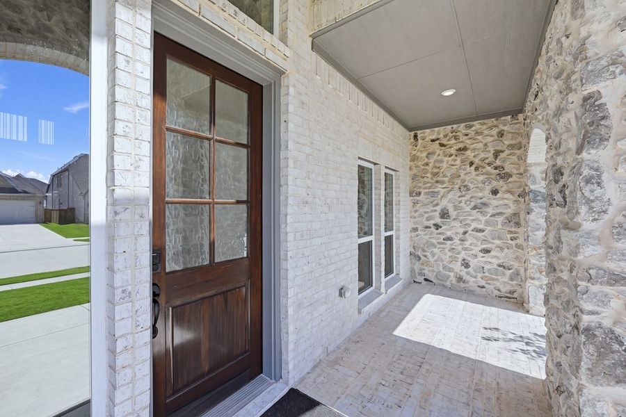 Exterior details and patio area of a home in The Ridge at Northlake, Northlake (Image 22).
