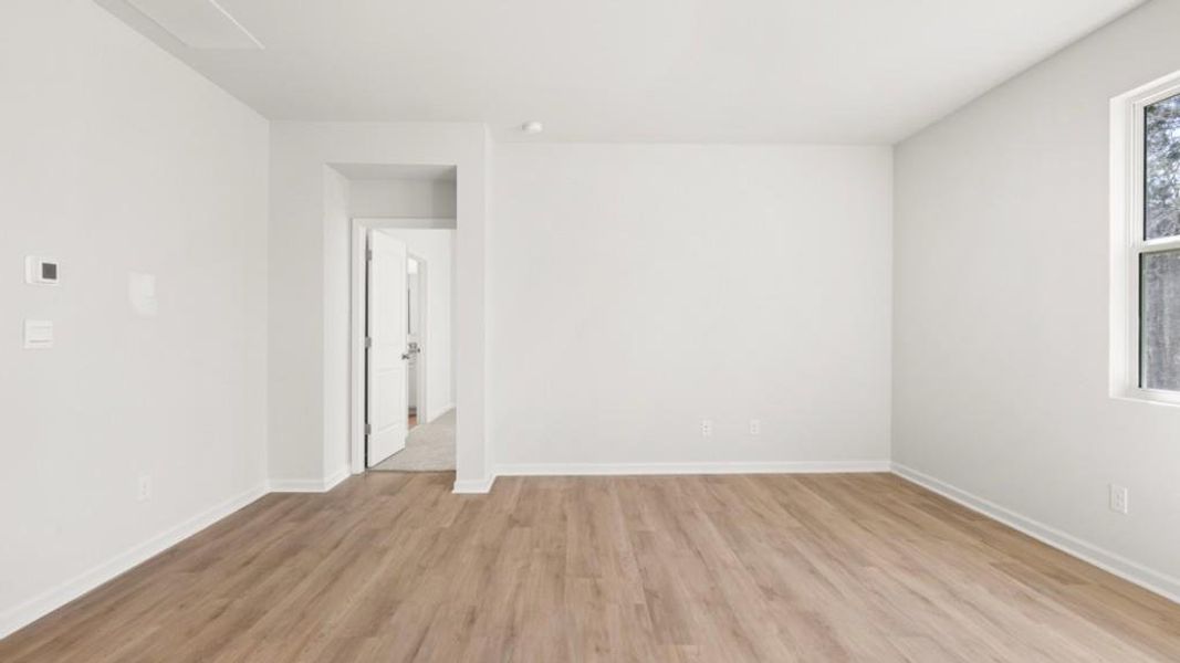 Spacious, unfurnished interior of a new home in South Wind, Fairburn (Image 23).
