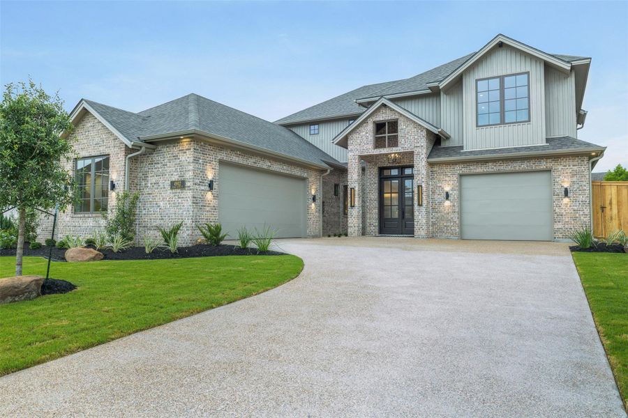 Front exterior of a new home in , College Station, TX, highlighting curb appeal (Image 24).