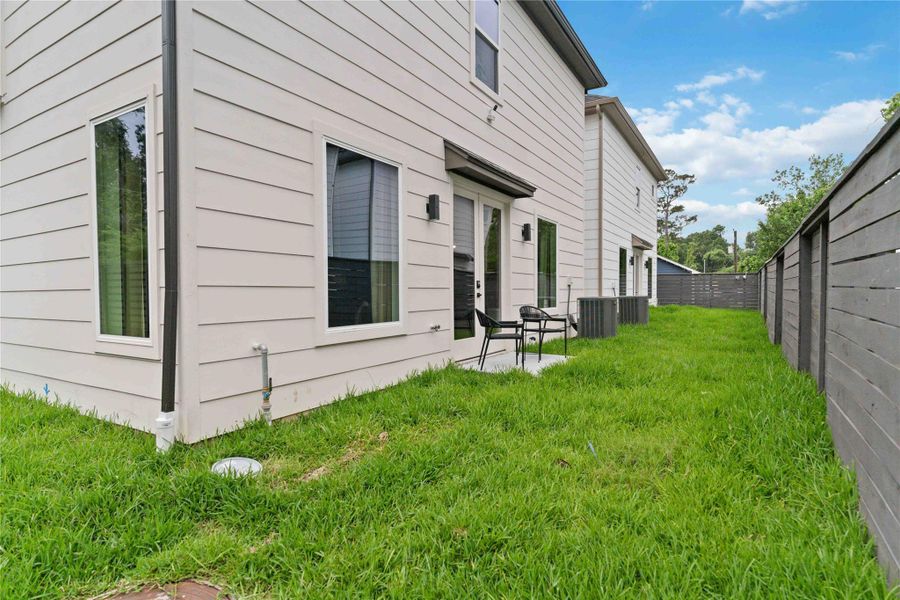 Exterior details and patio area of a home in , Houston (Image 3).