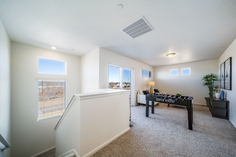 Furnished interior view inside a new home in Thompson River Ranch, Johnstown (Image 10).