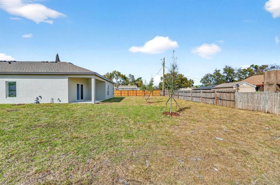 Exterior details and patio area of a home in , Deltona (Image 3).