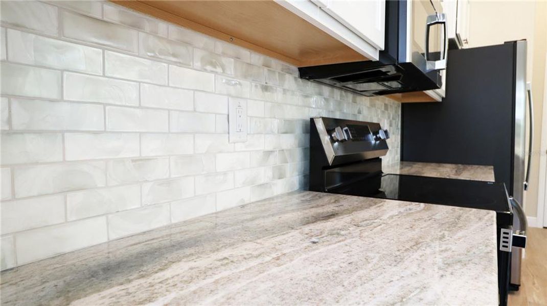 Exterior details and patio area of a home in , Brooksville (Image 20).