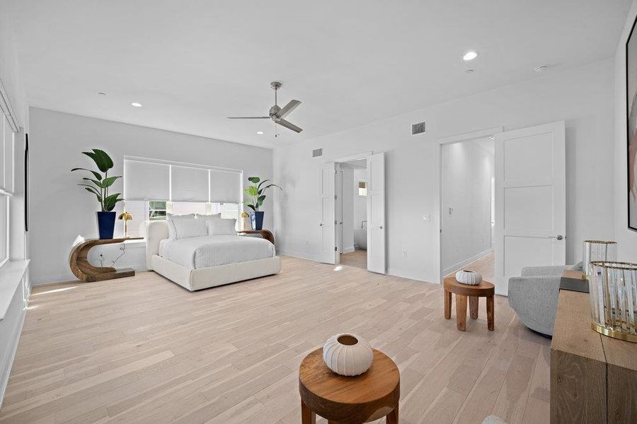 Bedroom with light wood-style floors, recessed lighting, and ceiling fan Bedroom with light wood-style floors, recessed lighting, and ceiling fan