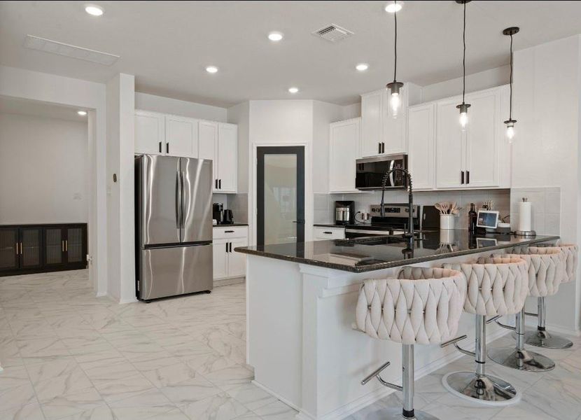 Furnished interior view inside a new home in Sonterra - Cool Water, Jarrell (Image 6).