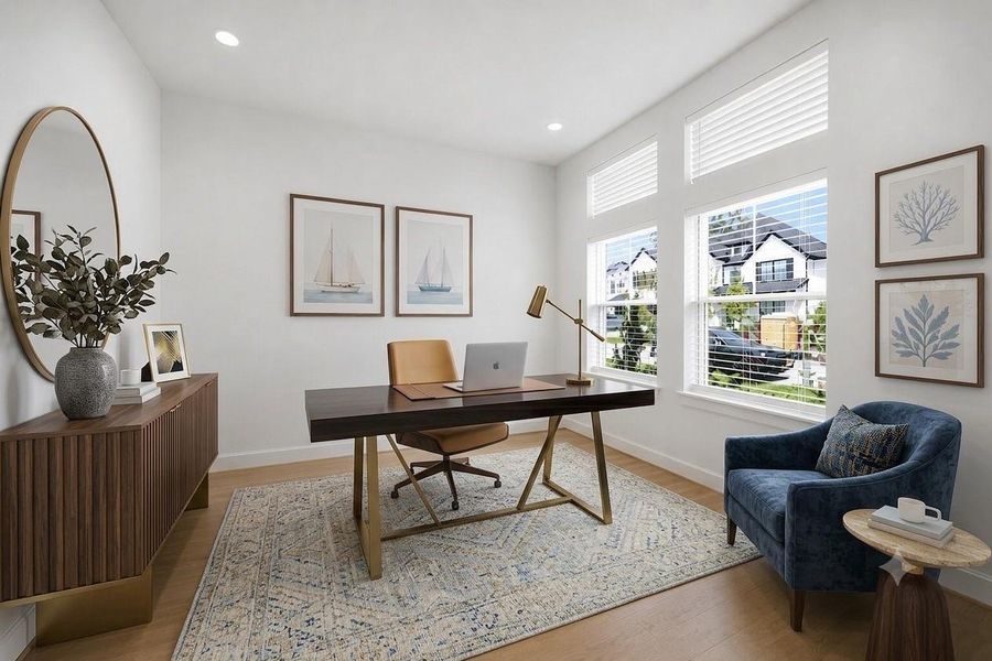 **Virtually Staged** Dedicated home office with large windows and flexible functionality—perfect for remote work or creative space.