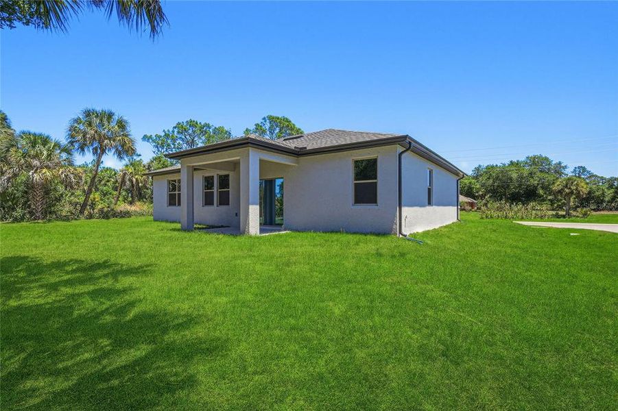 Exterior details and patio area of a home in , North Port (Image 26).