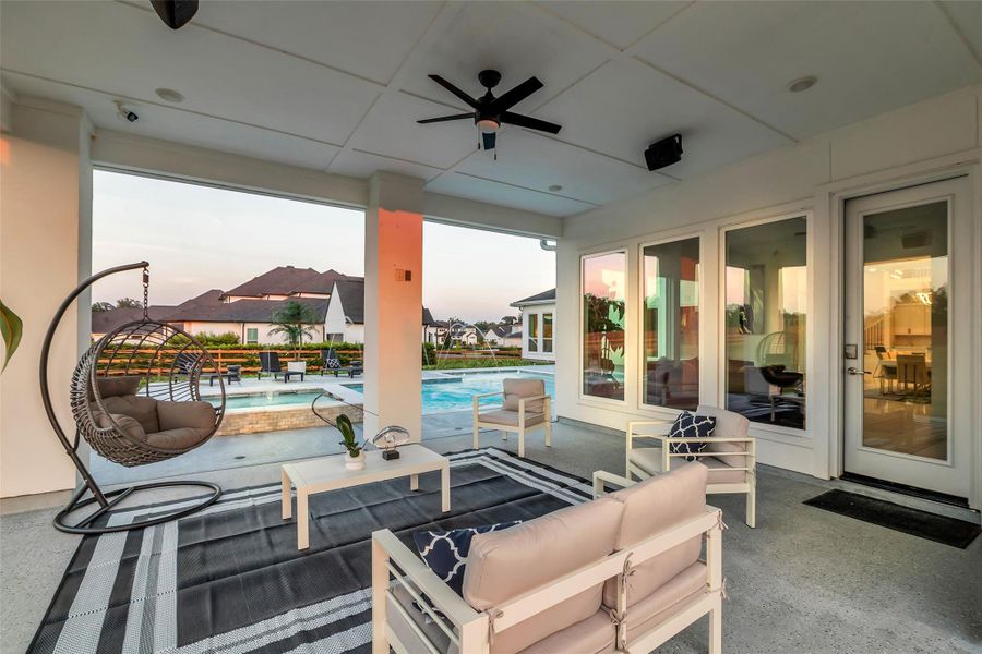 Covered Outdoor Living:A refined extension of the home, this covered patio blends comfort and sophistication with room for lounging, dining, and entertaining. Overlooking the sparkling pool, it offers a serene retreat where every gathering feels effortless and every moment feels elevated.