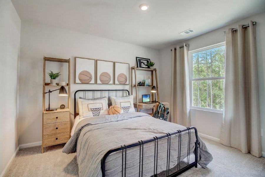 A bedroom with a bed and a shelf with a window. A bedroom with a bed and a shelf with a window.