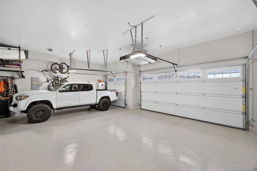 Paint, epoxy floors, added shelving 3 car plus storage Paint, epoxy floors, added shelving 3 car plus storage