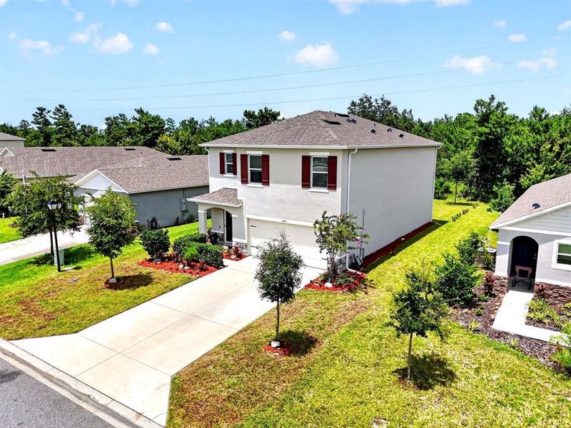 Front exterior of a new home in , Ormond Beach, FL, highlighting curb appeal (Image 25). Front exterior of a new home in , Ormond Beach, FL, highlighting curb appeal (Image 25).