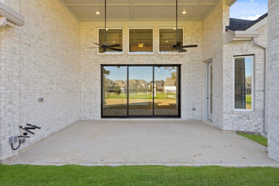 Exterior details and patio area of a home in , Spring (Image 4).