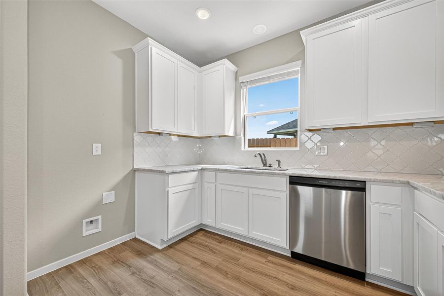 Furnished interior view inside a new home in Sunterra, Katy (Image 8).