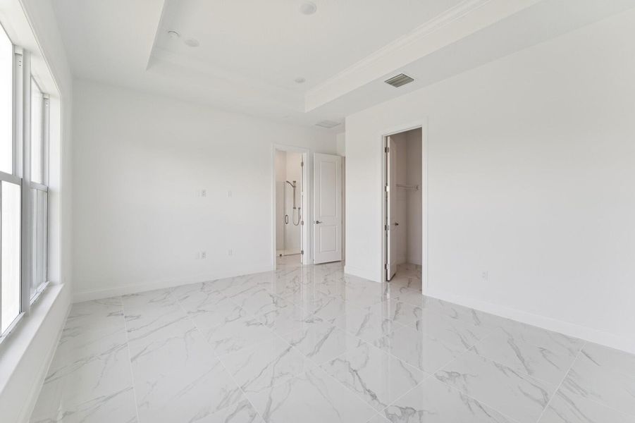 Spacious, unfurnished interior of a new home in Salerno Reserve - Single Family, Stuart (Image 41). Spacious, unfurnished interior of a new home in Salerno Reserve - Single Family, Stuart (Image 41).