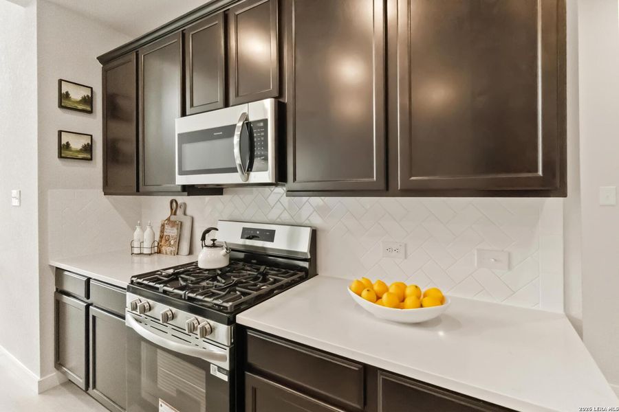 Furnished interior view inside a new home in Hickory Ridge, Elmendorf (Image 13).