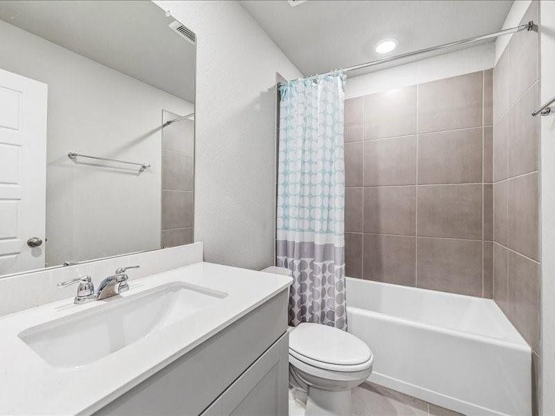 Furnished interior view inside a new home in Montgomery Oaks - Premier, Conroe (Image 6).