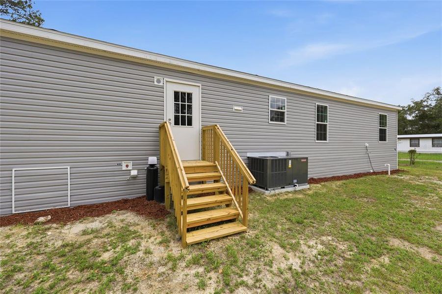 Exterior details and patio area of a home in , Bronson (Image 23).