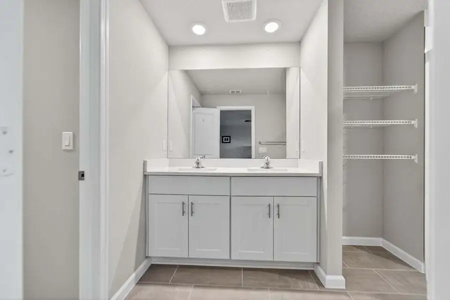 Furnished interior view inside a new home in Enclave at Mangonia Park, West Palm Beach (Image 8).