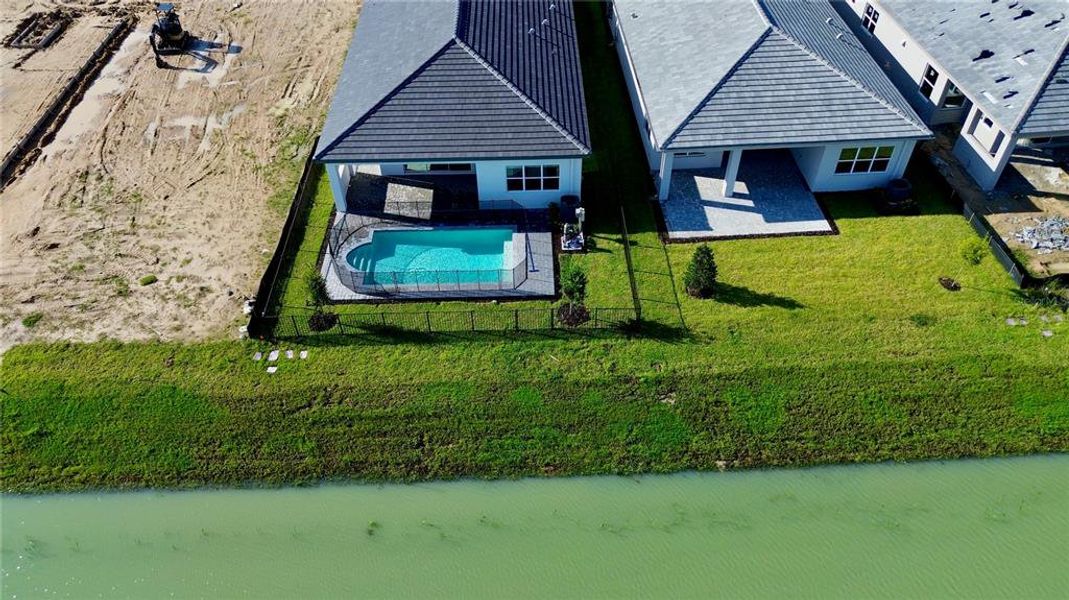 Front exterior of a new home in Valencia Ridge, Wesley Chapel, FL, highlighting curb appeal (Image 2).