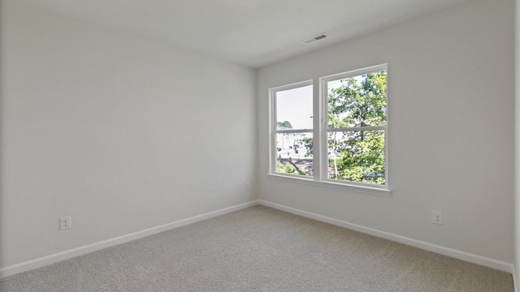 Spacious, unfurnished interior of a new home in Copper Run South, Durham (Image 19).