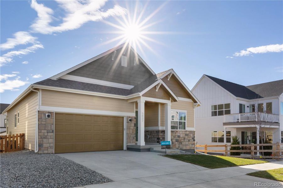 Front exterior of a new home in Dillon Pointe - Journey, Broomfield, CO, highlighting curb appeal (Image 19).