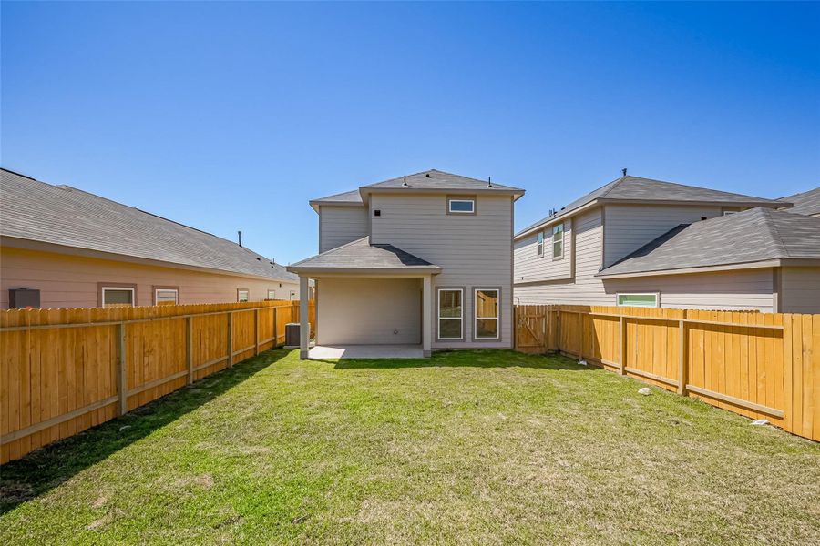 Exterior details and patio area of a home in River Ranch, Dayton (Image 3).