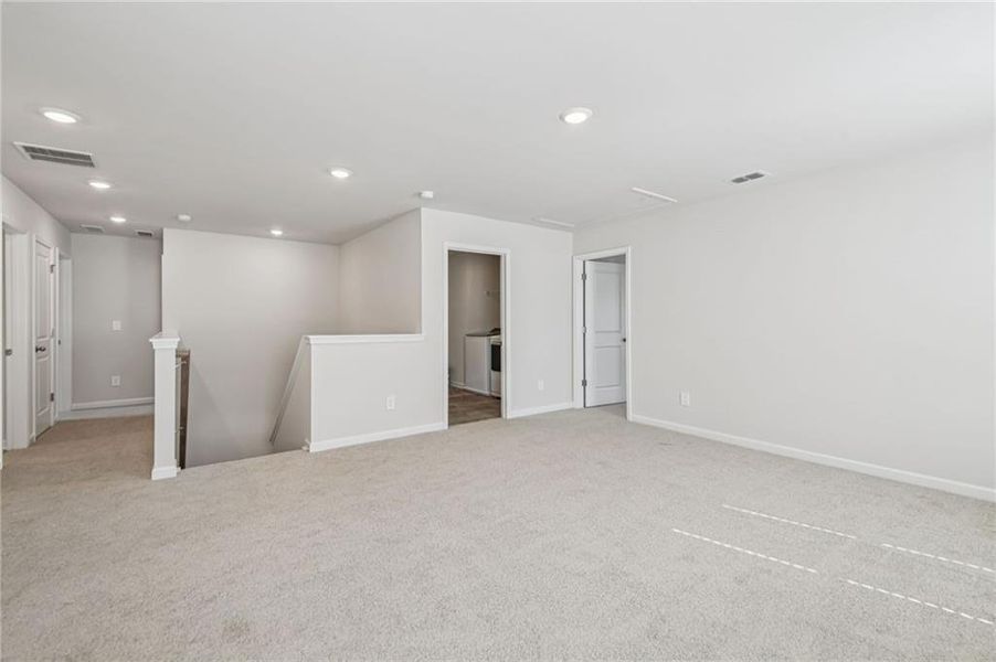 Spacious, unfurnished interior of a new home in Creekside at Oxford Park, Fairburn (Image 25).